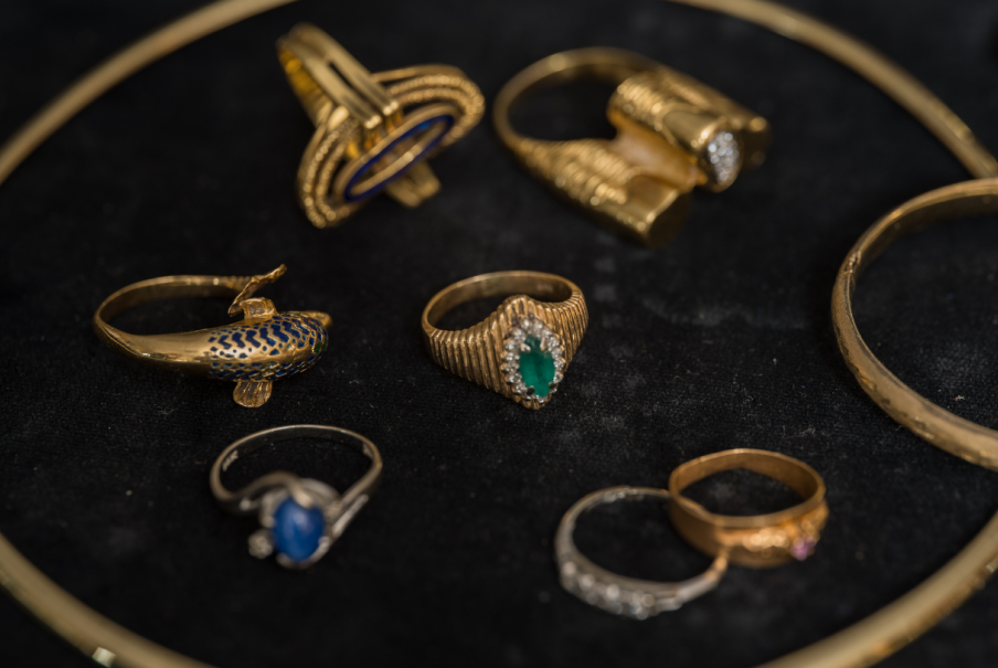 Antique gold jewelry displayed for appraisal and gold pricing estimation