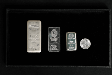 Silver bars and silver coins size comparison