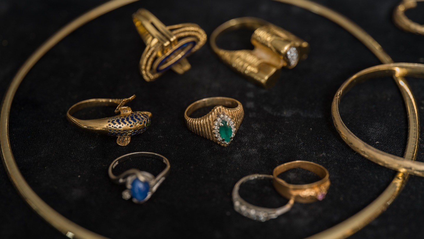 Antique gold jewelry displayed for appraisal and gold pricing estimation